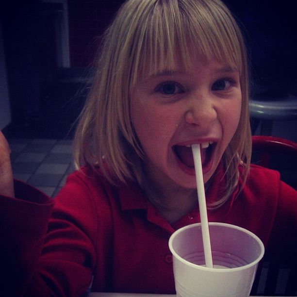 little girl straw on tooth instagram