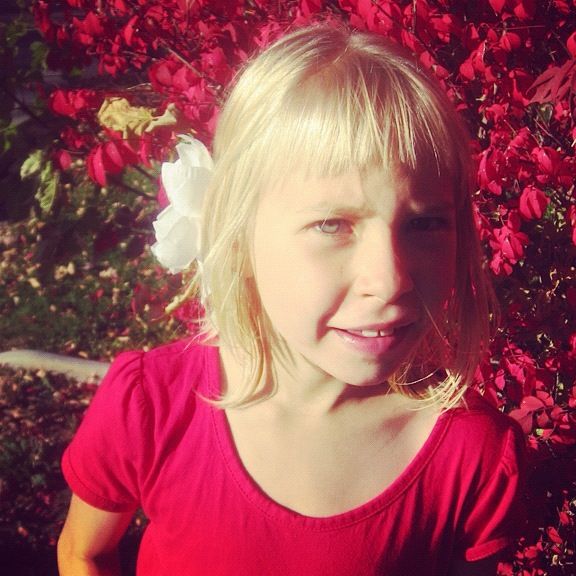 little girl red leaves instagram