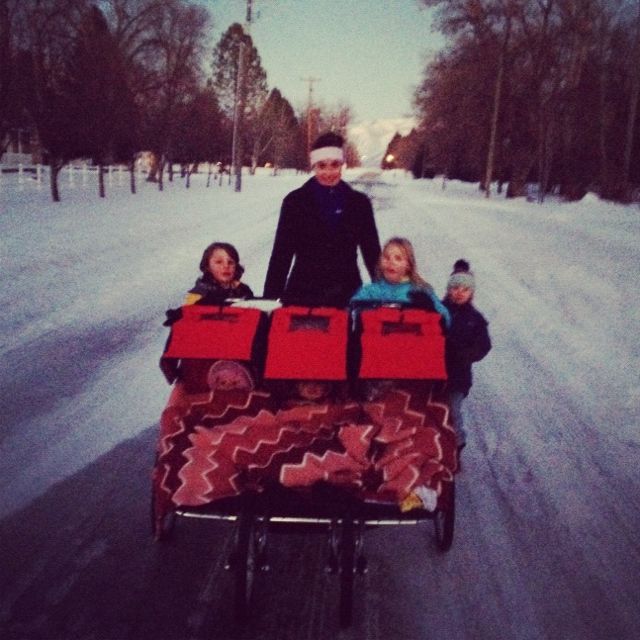 family on walk in snow instagram