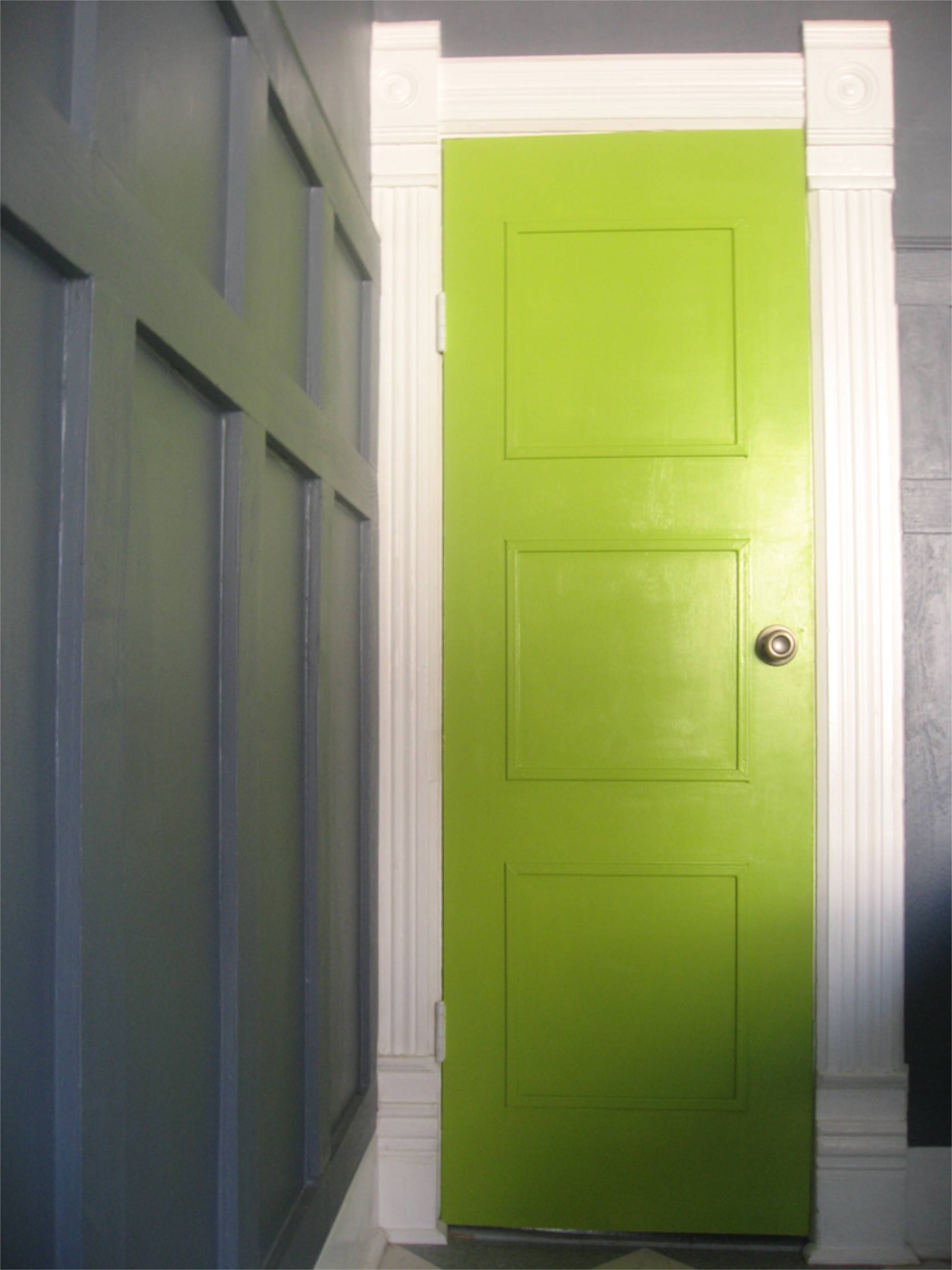 grey wainscoting chartreuse door