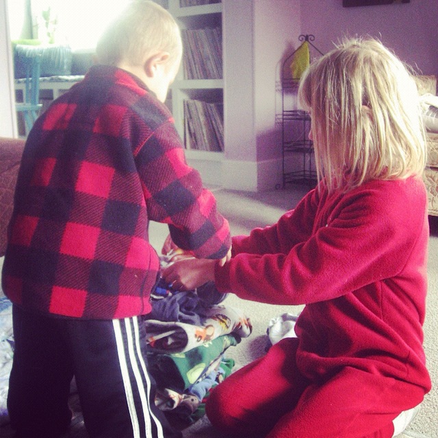 little boy and girl folding laundry instagram